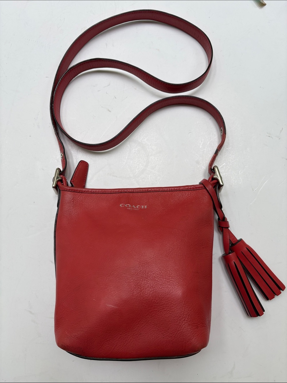 COACH Deep Orange Leather Crossbody with Tassel Accent